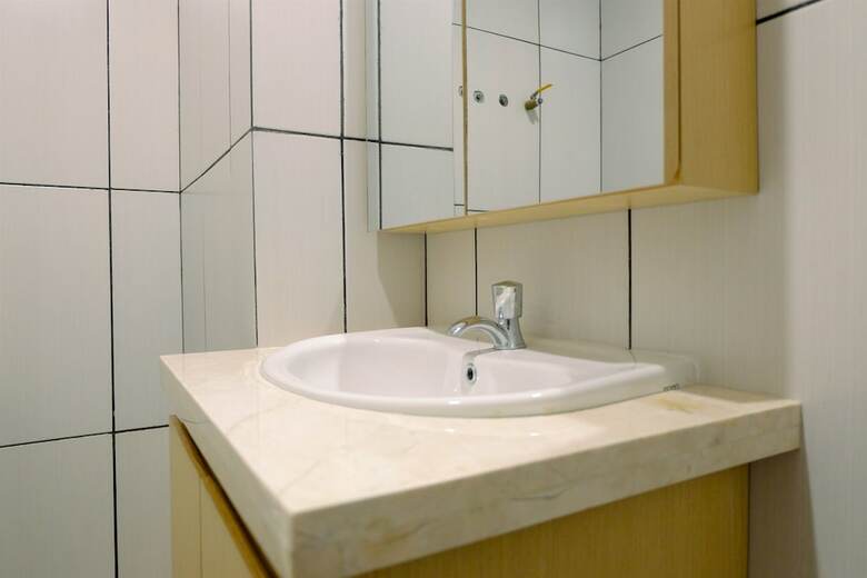 Homey Studio Apartment At Grand Kamala Lagoon