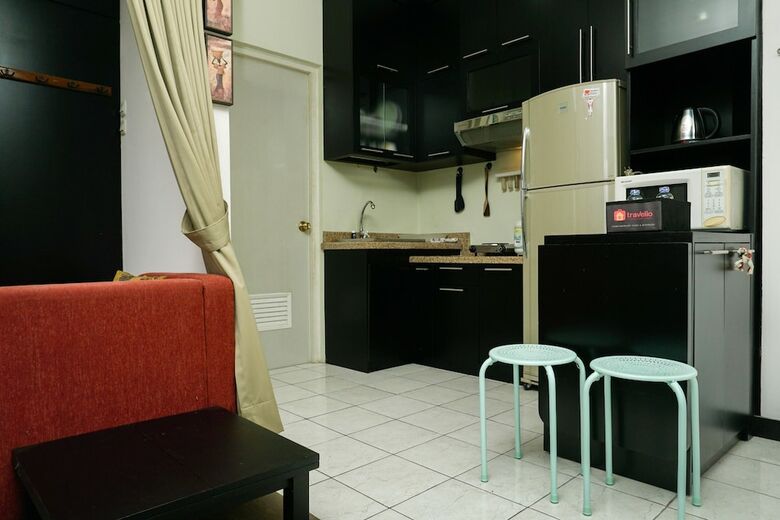 Big And Cozy Studio Apartment At Puri Garden