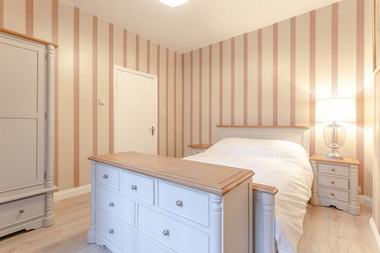 Elegant 2 Bedroom British Themed Apartment