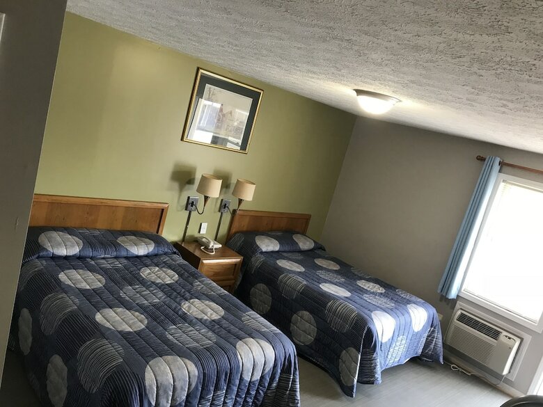 Motel Travelers Inn And Suites