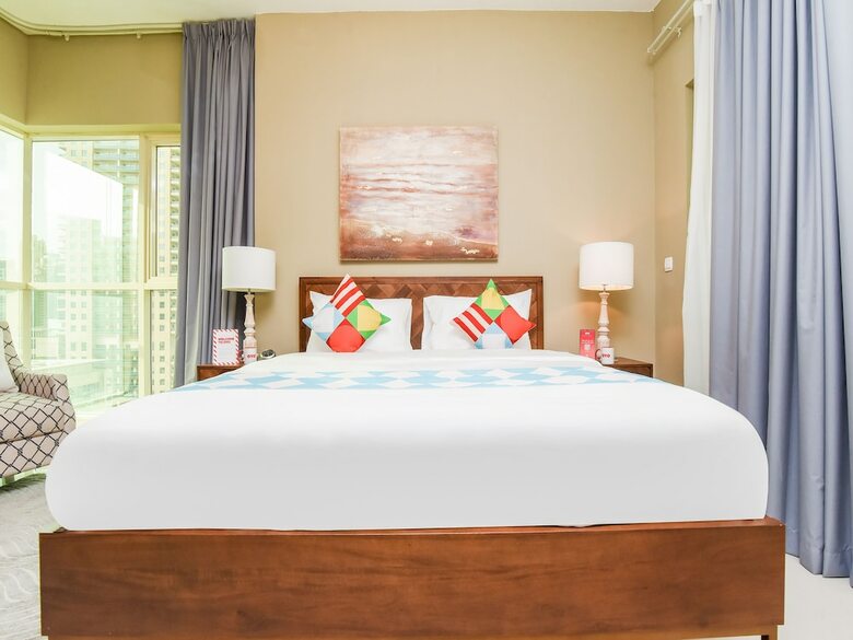 Apartamento Oyo 242 Home Marina Suites 2 Br