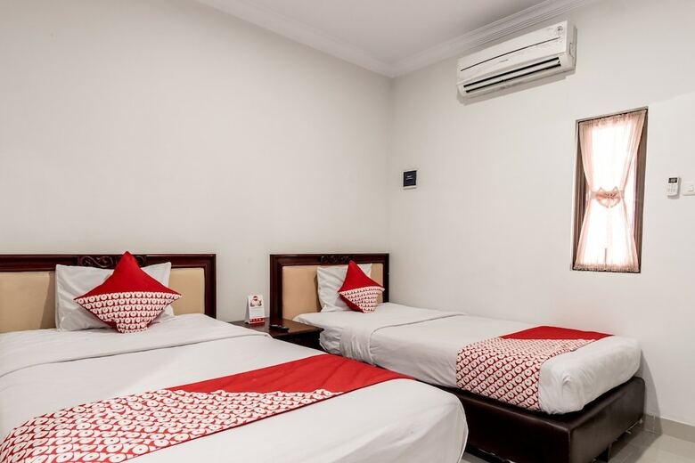 Hostal Oyo 283 Helvetia Residence