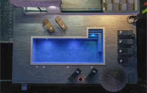 Four-bedroom Holiday Home In Kucine