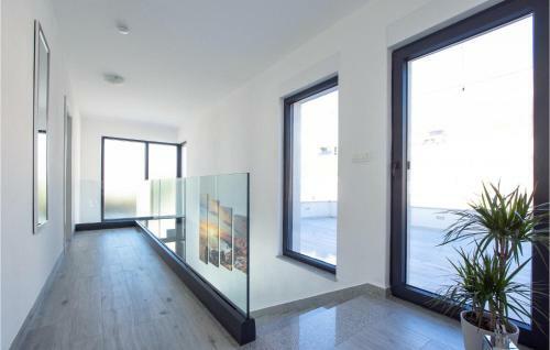Four-bedroom Holiday Home In Kucine