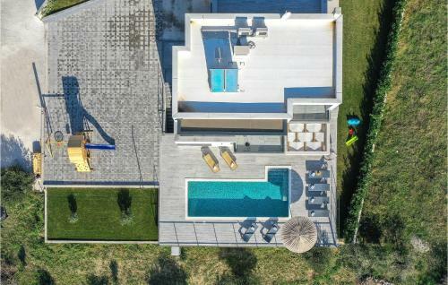 Four-bedroom Holiday Home In Kucine