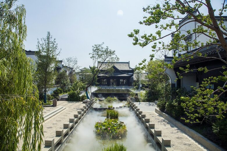 Riad Xinhualian Lv Xin Gu Hotel
