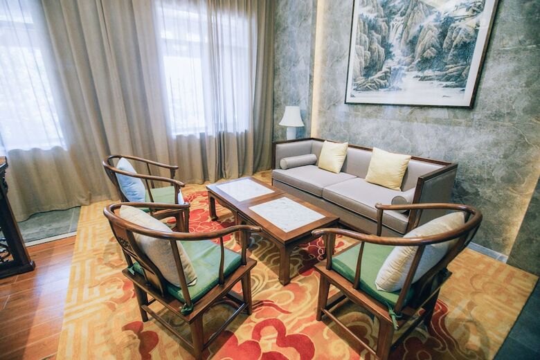 Riad Xinhualian Lv Xin Gu Hotel