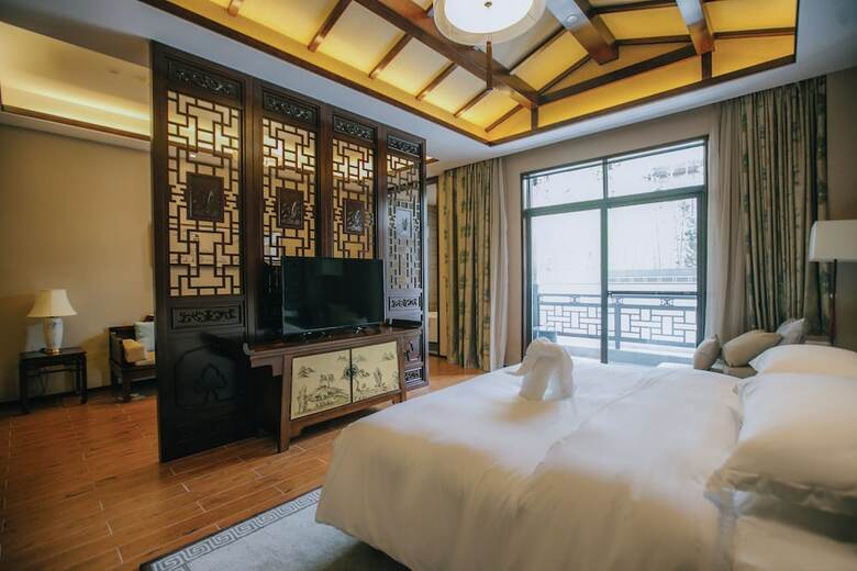 Riad Xinhualian Lv Xin Gu Hotel