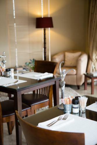 Hostal Four Palms Accommodation & Conferencing