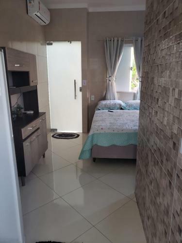 Quarto Tipo Kit Net Na Parte Externa Da Casa