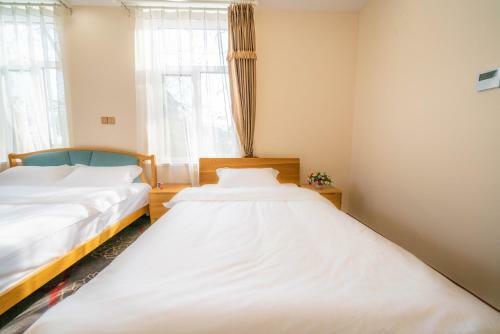 Qingdao Top Yunyin Homestay