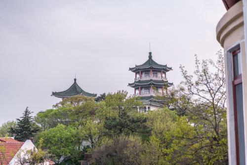 Qingdao Top Yunyin Homestay