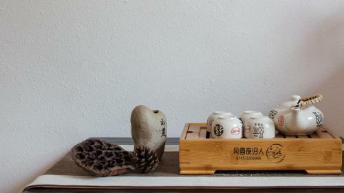 Floral Hotel Fengxue Yeguiren