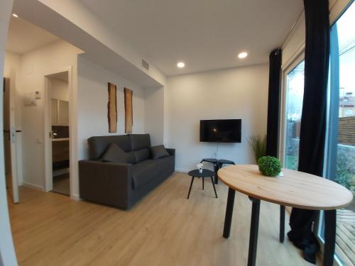 Acero Y Piedra Apartamentos Con Jard�n