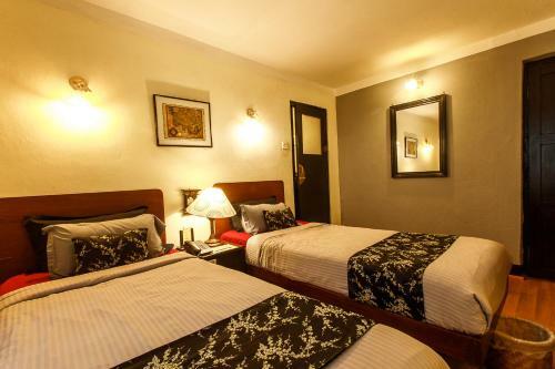 Hotel Ambassador Garden Home