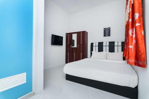 Hotel Oyo Life 2911 Merpati Kost