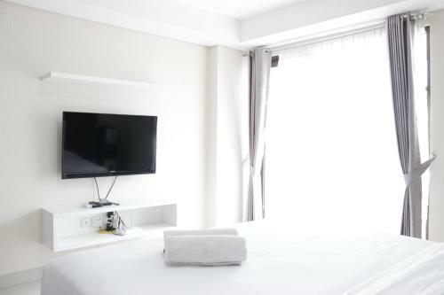 Comfy Studio Apartment At Tamansari Tera Residence By Travelio