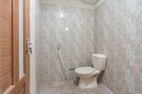 Hotel The Lima Guest House Syariah