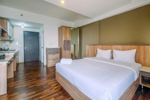 Modern And Cozy Studio Park View Apartment By Travelio