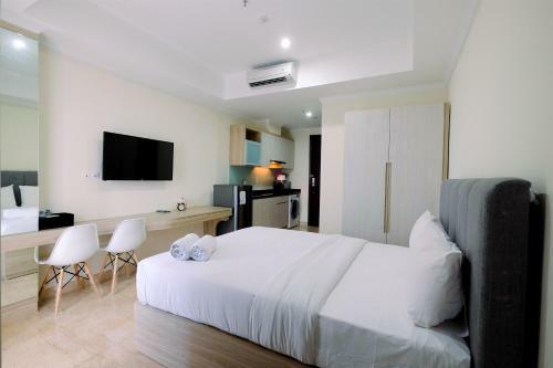 Cozy Studio Menteng Park Apartment By Travelio