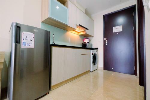 Cozy Studio Menteng Park Apartment By Travelio