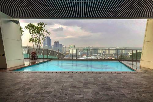 Minimalist Studio Menteng Park Apartment By Travelio