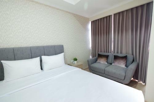 Minimalist Studio Menteng Park Apartment By Travelio