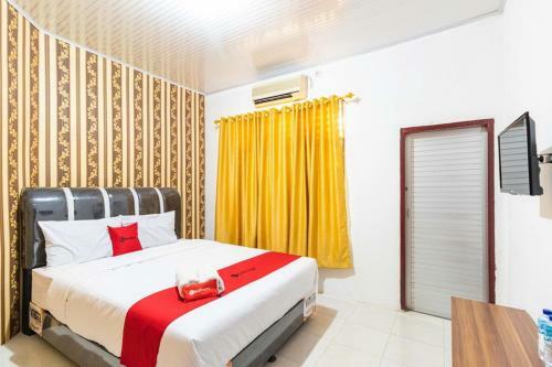 Hostal Reddoorz Plus Near Universitas Methodist Medan