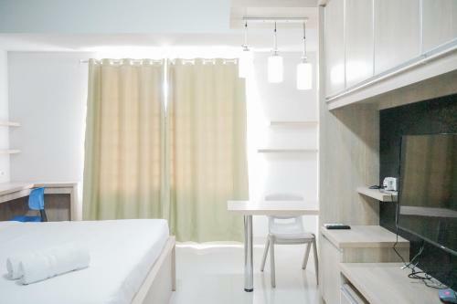 Comfy Studio At Trimezia Beverly Apartment By Travelio