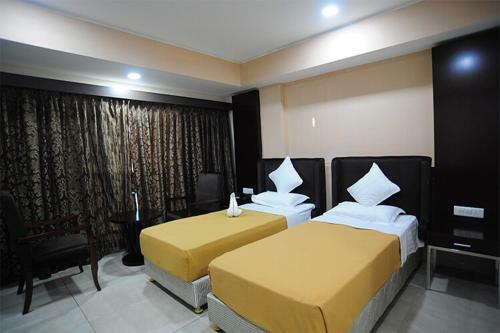 Hotel Pride Biznotel - The Maison Anand
