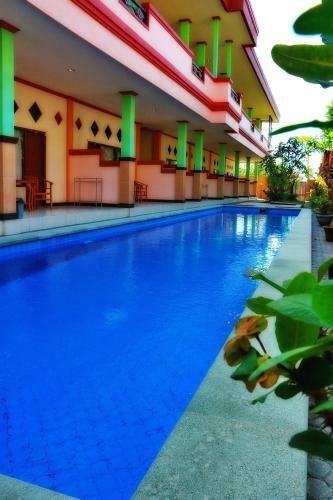 Hotel Taxa Inn Kuta Raya
