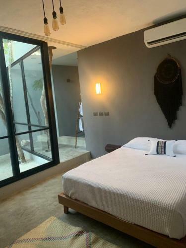 Arich� Tulum Hotel & Hostal