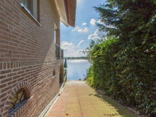 Waterfront Holiday Home In Veen With Terrace