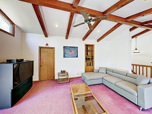 New Listing! Fireside Fun With Deck, Game Room & Bar Home