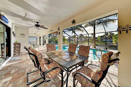 Canal-front Getaway - Boat Dock & Heated Pool Home