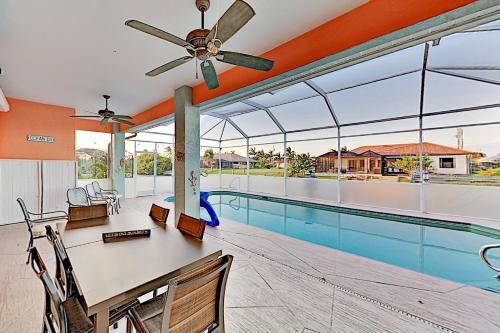 Lavish Canal-front Getaway With Heated Pool & Dock Home