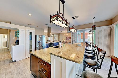 Lavish Canal-front Getaway With Heated Pool & Dock Home