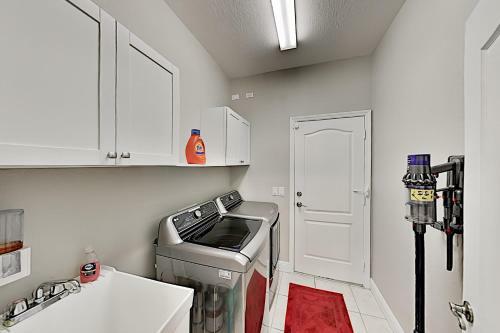 Canalfront Beauty With Private Heated Pool & Garage Home