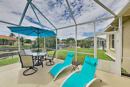 Canalfront Beauty With Private Heated Pool & Garage Home