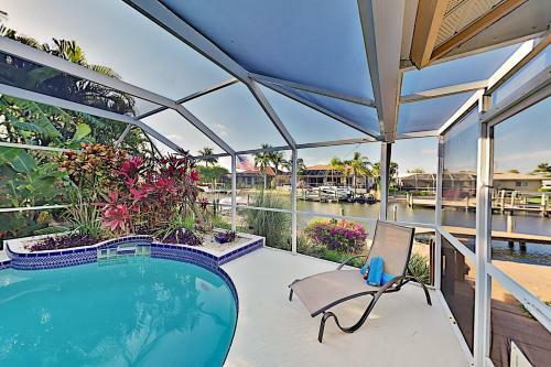 Canal-front Retreat With Boat Dock & Screened Pool Home