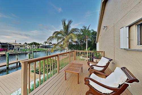 Canal-front Retreat With Boat Dock & Screened Pool Home