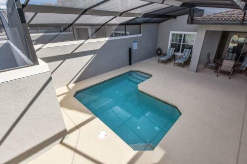 Modern 4 Bed 3 Bath Townhome In Championsgate Golf Resort