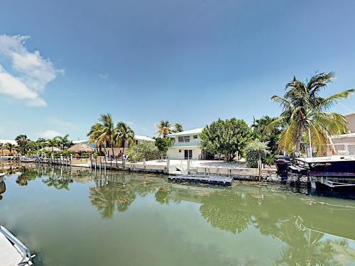 New Listing! Canal-front Retreat With Dock, Balcony Home