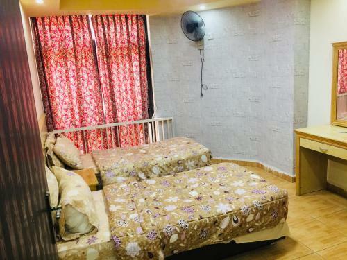 Al Amera Hotel Apartment