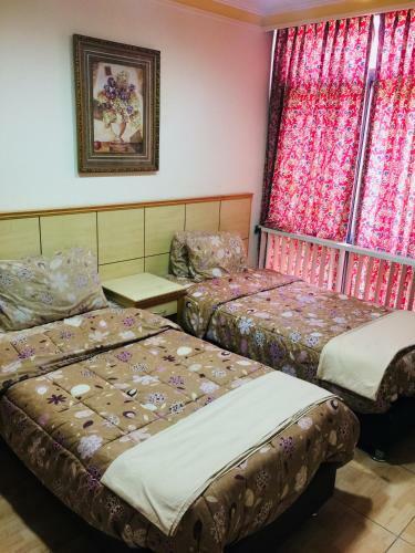 Al Amera Hotel Apartment