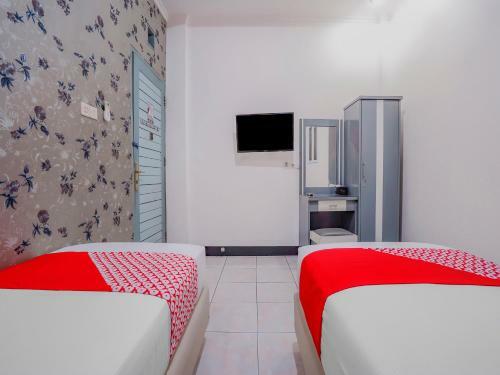 Oyo 90064 Hotel Salon Fora & Cafe