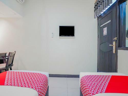 Oyo 90064 Hotel Salon Fora & Cafe