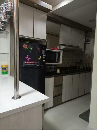 Emerald Tower Apartemen By Arra