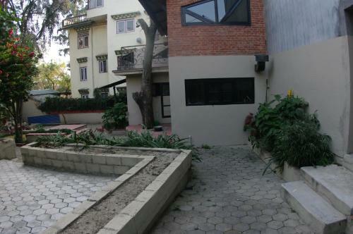 Hostal Laughing Buddha Hotel & Garden Theater