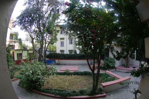 Hostal Laughing Buddha Hotel & Garden Theater